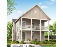 Charming two-story home featuring a quaint front porch and a mix of modern and traditional architectural elements at 230 Clearpath Dr, Summerville, SC 29486