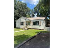 Charming single-story home with light siding, shuttered windows, and well-maintained front yard at 5010 Converse St, North Charleston, SC 29405