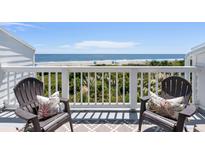 Beautiful balcony view with two chairs and a view of the beach at 7 Beach Club Villas, Isle of Palms, SC 29451