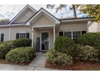 Charming single-story home with inviting front porch and well-maintained landscaping at 7322 Stoney Moss Way, Hanahan, SC 29410