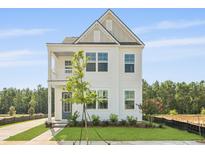 Charming two-story home with a covered porch and attractive landscaping at 212 Terrace View Dr, Summerville, SC 29486