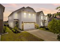 Charming two-story home featuring a two-car garage, manicured lawn, and inviting curb appeal at 515 Purple Finch Rd, Summerville, SC 29486