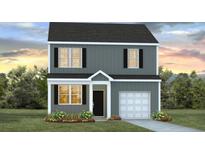 Charming two-story home with gray siding, black shutters, and a well-manicured lawn at 8026 Rackham Rd, Hollywood, SC 29470