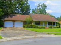 Charming single-story home with a two-car garage and a well-manicured front lawn at 1103 Stone Pine Rd, Ladson, SC 29456