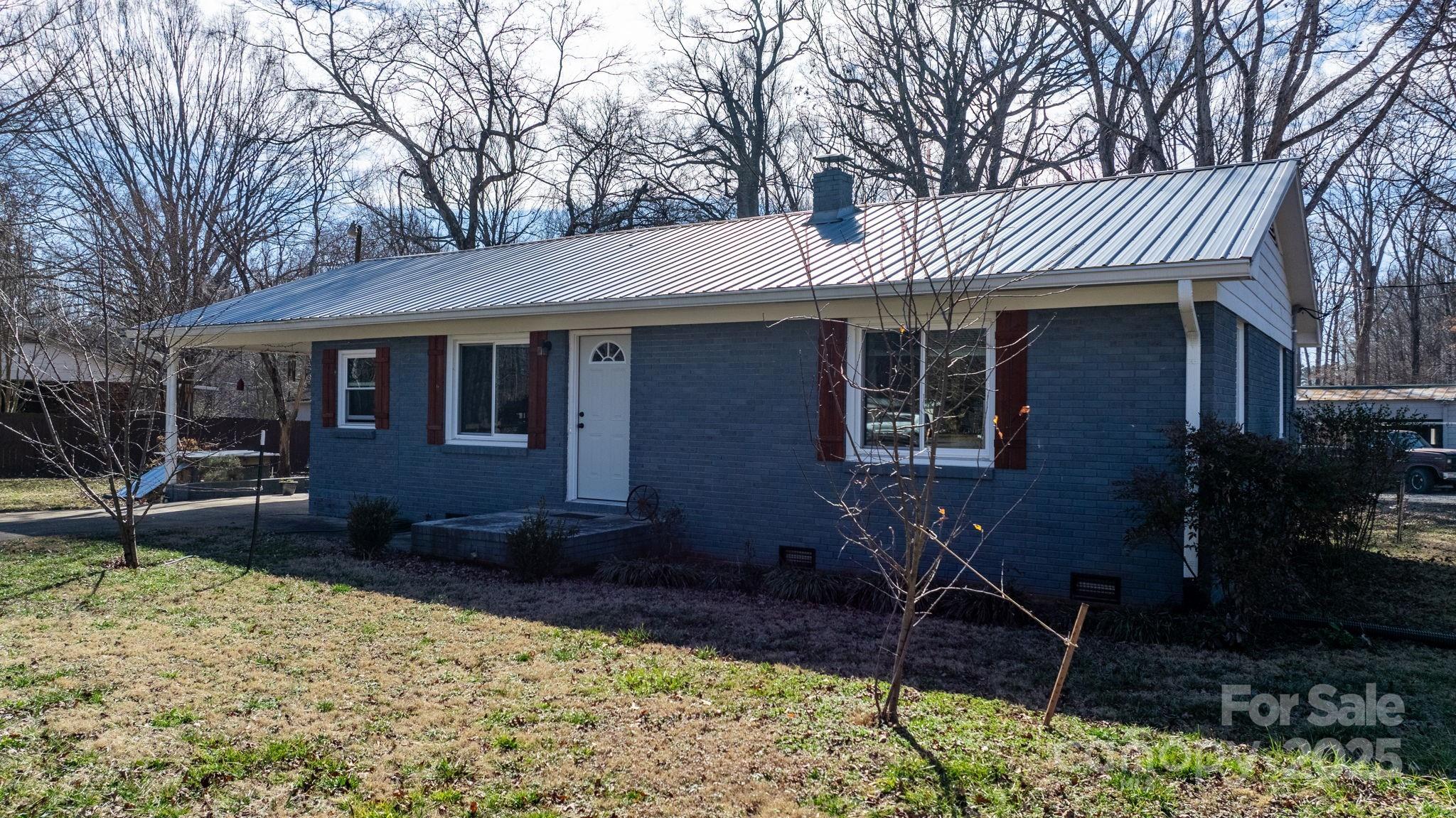 Photo one of 3021 Tryon Courthouse Rd Bessemer City NC 28016 | MLS 4217769