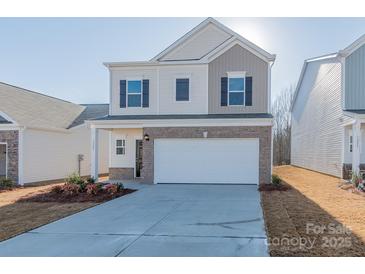 Two-story house with neutral siding and a white garage door at 1229 Red River Dr, Salisbury, NC 28144