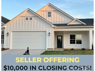 Charming two-story home with white siding, a two-car garage, and inviting curb appeal at 120-B Deer Brook Dr, Shelby, NC 28150