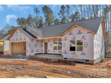 New construction home featuring an attached garage, and windows on a building site at 6155 Long Branch Rd, Salisbury, NC 28147