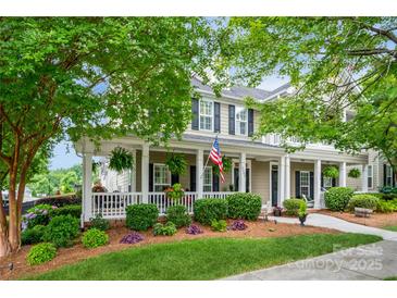 Two-story home with front porch and landscaped yard at 3203 Kelsey Plz, Kannapolis, NC 28081