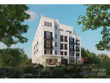 Luxury building exterior, showcasing elegant design and landscaping at 409 Queens Rd # 204, Charlotte, NC 28207
