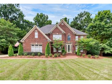 Brick two-story house with landscaping and a large yard at 508 Cobbs Glen Ct, Rock Hill, SC 29732