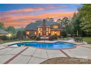 Luxury home with inground pool and spacious backyard at 7025 Willow Trace Ln, Weddington, NC 28104