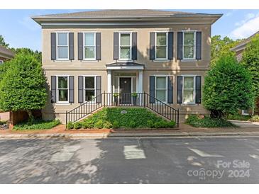 Two-story house with shutters, steps, and landscaping at 1218 Wareham Ct, Charlotte, NC 28207