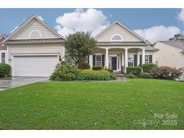 Craftsman style home with two-car garage and manicured lawn at 3015 Duclair Ln, Fort Mill, SC 29707