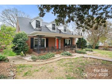 Brick home with a large front porch and walkway at 515 S Academy St, Lincolnton, NC 28092