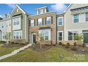 Modern three-story townhome with landscaping at 939 Cobbled Way, Fort Mill, SC 29715