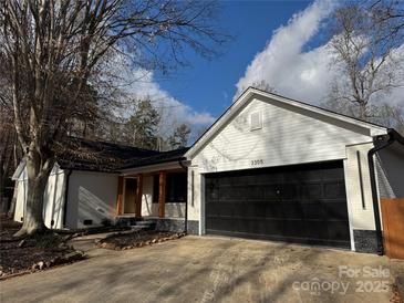 Updated Ranch home with modern exterior and a two-car garage at 3305 Cameo Trl, Gastonia, NC 28056