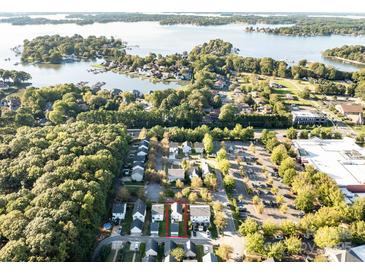 Aerial view of a house and neighborhood, showing location and proximity to water at 16518 Ambassador Park Dr, Huntersville, NC 28078