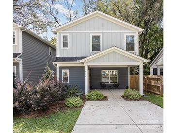 Charming two-story house with gray siding and a welcoming front porch at 4114 Rutgers Ave, Charlotte, NC 28206