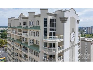 Upscale multi-story building with balconies and clock tower at 520 E Martin Luther King Blvd # 1204, Charlotte, NC 28202