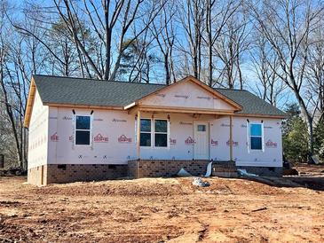 Newly constructed house with brick facade and gray shingle roof at 99 Wilson Ln # 3, Taylorsville, NC 28681