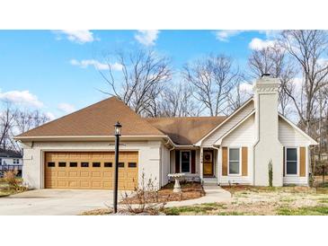 Ranch style home with attached garage and landscaped yard at 1509 Cripple Creek Rd, Kannapolis, NC 28081