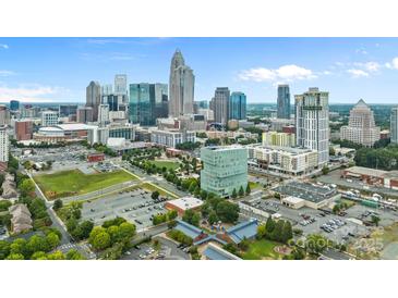 Drone view of uptown Charlotte, NC skyline, buildings, and park at 708 N Davidson St, Charlotte, NC 28202