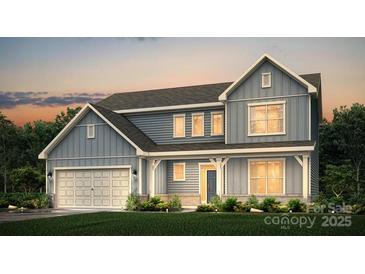 Two-story house with gray siding, white trim, and a double-car garage at 121 Jentri Way, Mooresville, NC 28115