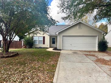 House exterior features a large driveway and landscaped yard at 841 Settlement Dr, Clover, SC 29710