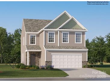 Two-story house with a neutral color scheme and a two-car garage at 1793 Otter Perch Ln, Fort Mill, SC 29715