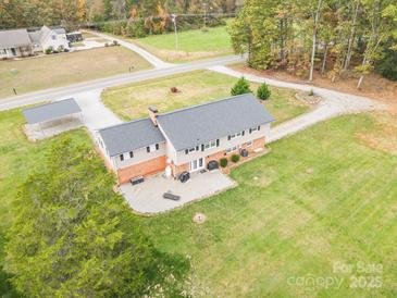 Two-story home with patio and large backyard at 1926 Hopewell Church Rd, Sherrills Ford, NC 28673
