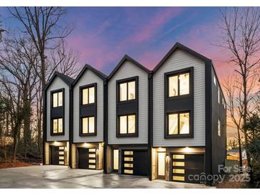 Three modern townhouses with attached garages and stylish exterior at 158 Mattoon St, Charlotte, NC 28216