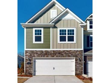 Two-story home with stone accents and a two-car garage at 3543 Nimbell Rd, Monroe, NC 28110