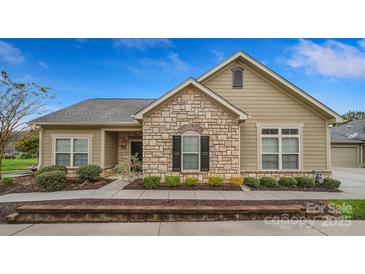 Attractive craftsman style home with stone accents and landscaping at 4919 Polo Gate Blvd, Charlotte, NC 28216