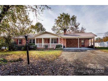 Brick ranch house with carport and front yard at 198 Dunlap Loop, Statesville, NC 28625