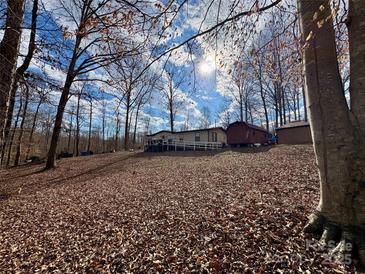 Single-wide mobile home on wooded lot with shed at 325 Scaley Bark Dr, Salisbury, NC 28147