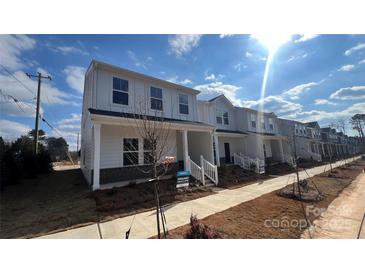 Brand new townhome community with inviting front porches at 105 Ciara Pl # A, Mooresville, NC 28117