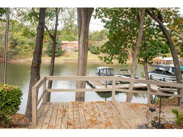 Lakefront deck with boat slips and fall foliage at 4130 Charlotte Hwy # G, Lake Wylie, SC 29710