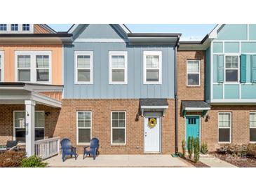 Townhome exterior with light blue siding and white door at 1094 Herrons Ferry Rd, Rock Hill, SC 29730