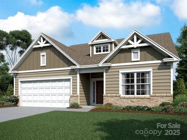 Craftsman style home with neutral siding and a two-car garage at 9130 Dulwich Dr # Ken0079, Charlotte, NC 28215