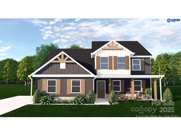 Charming two-story home with brown shutters and a covered porch, showcasing a blend of modern farmhouse design at 4615 Yellow Poplar Ln, Concord, NC 28025