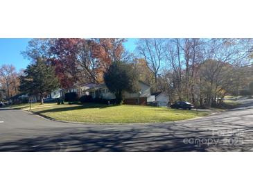 Residential neighborhood with homes and trees at 5745 Southampton Rd, Charlotte, NC 28217