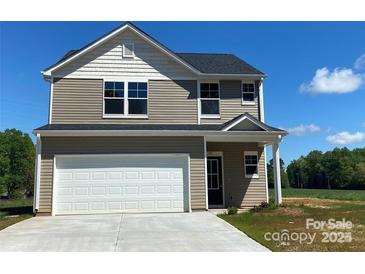 Charming two-story home featuring a classic design and a spacious two-car garage at 104 Salem Springs Ln, Statesville, NC 28625