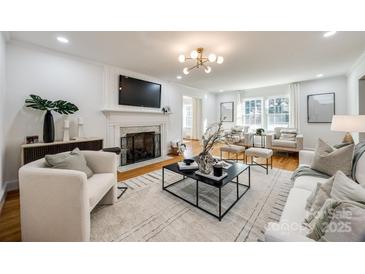 Bright living room with hardwood floors, fireplace, and stylish furnishings at 1081 Evergreen Cir, Rock Hill, SC 29732