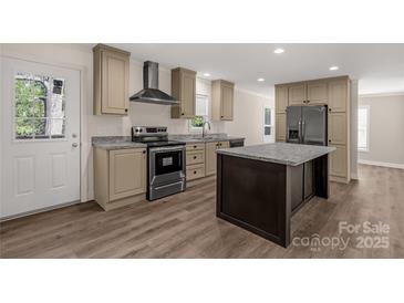 Modern kitchen with stainless steel appliances and an island at 1100 Turkey Creek Ridge Rd, York, SC 29745