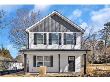 Two-story house featuring gray and white siding, and black shutters at 624 W Kerr St, Salisbury, NC 28144