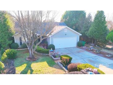 A tranquil neighborhood, with well-manicured landscaping, offering a serene residential atmosphere at 8430 Stoneman Pl, Charlotte, NC 28217