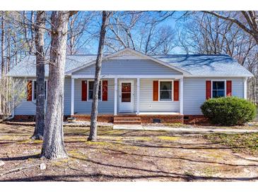 Charming single-story home with a cozy front porch and classic red shutters at 2544 Harmony Rd, Rock Hill, SC 29730