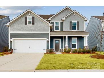 Two-story house with gray siding, two-car garage, and manicured lawn at 2078 Van Buren Rd, Sherrills Ford, NC 28673