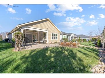 Spacious backyard with screened porch and patio at 4779 Looking Glass Trl, Denver, NC 28037